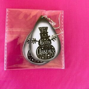 Elegant black and white snowman earrings